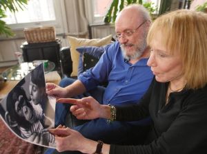 Jerry Mundis and Hester Mundis looking at an old picture of her and Boris.